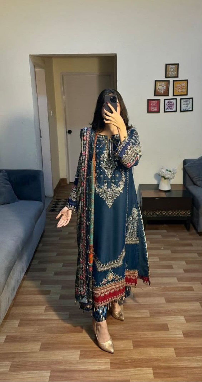Blue embroidered suit styled with printed dupatta
