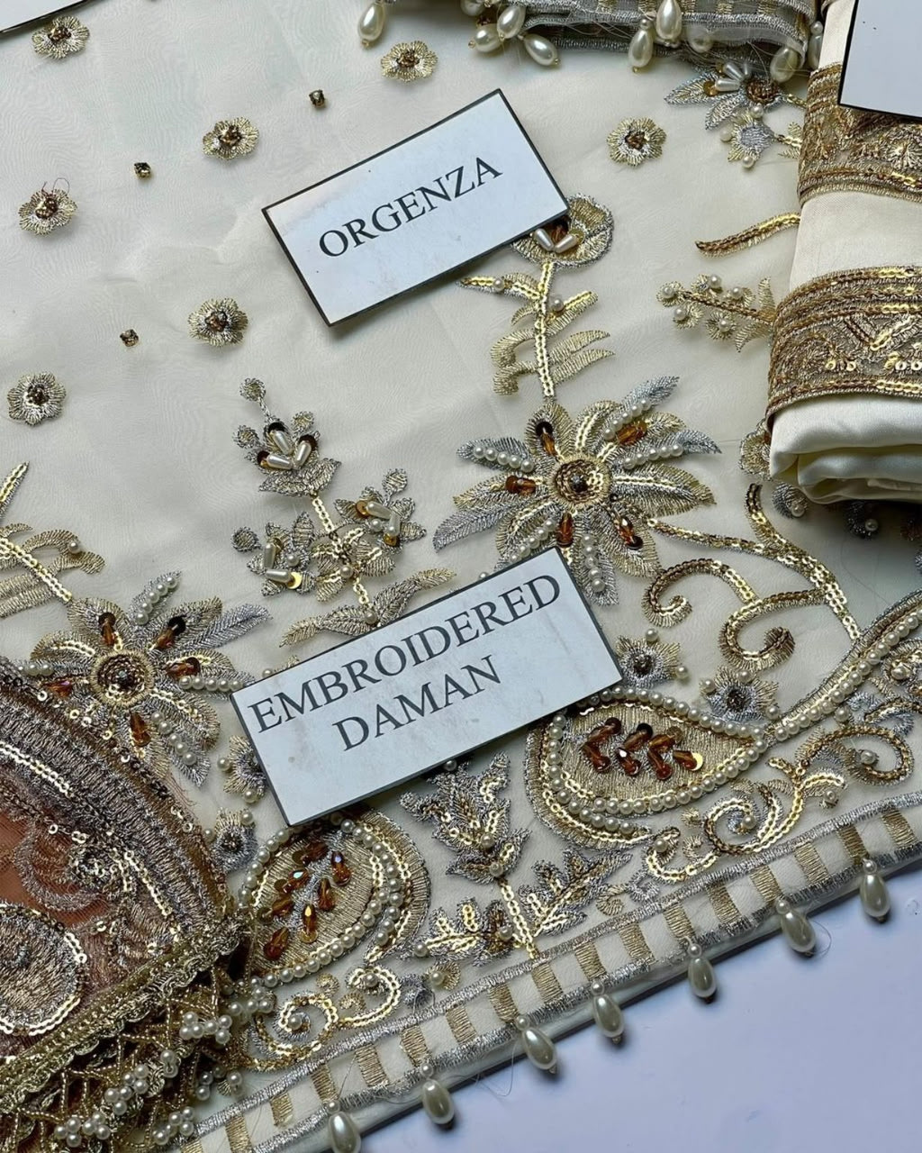 NAMEERA Wedding Wear embroidered sleeve pearl and adda work close-up